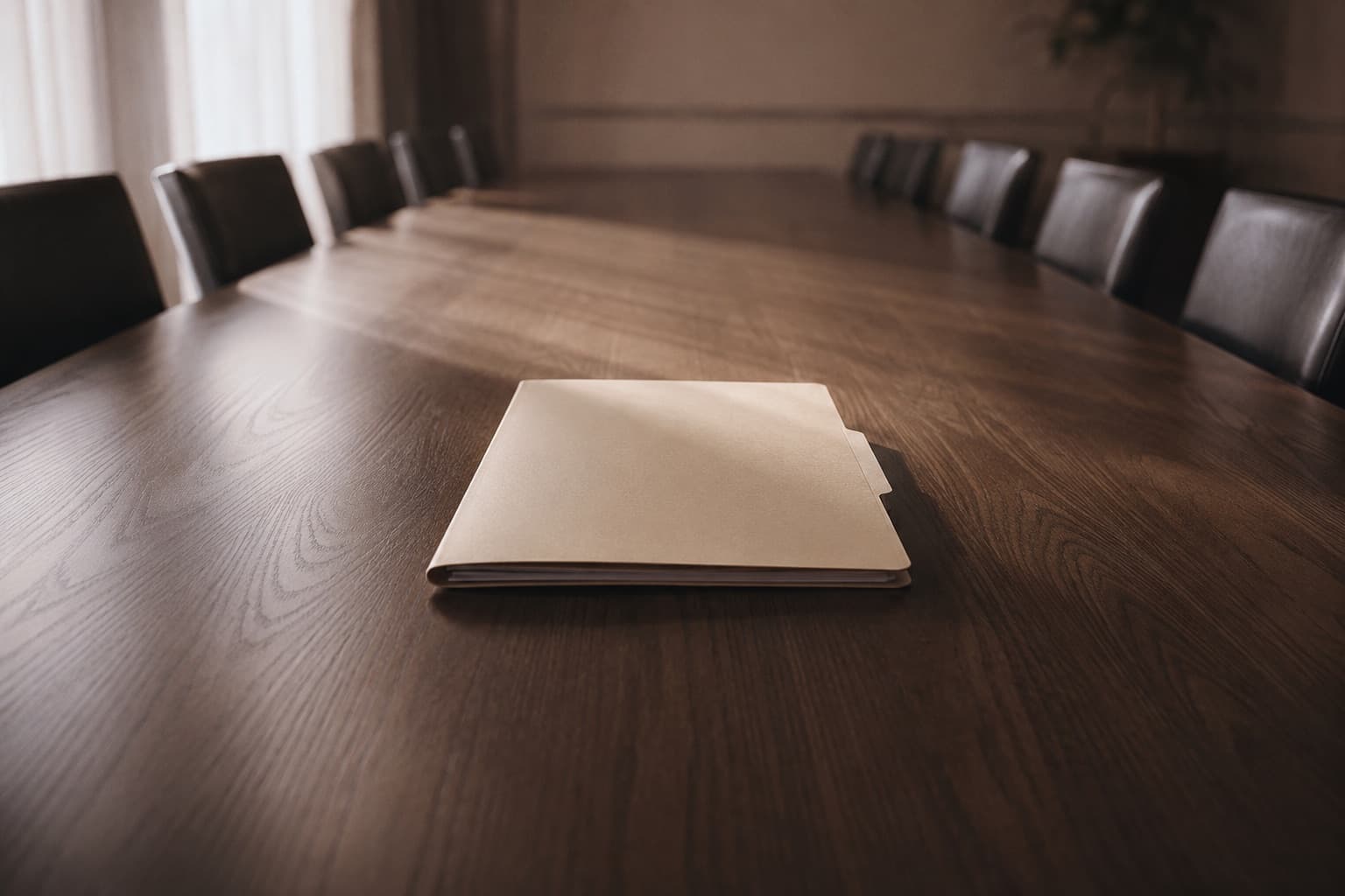 A single case folder on an empty conference table — one exclusive MVA lead delivered to one firm only